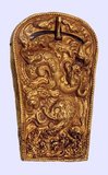 Ornemental belt buckle, decorated with a mythical animal and birds. Chiseled and hammered gold, late Han period, first or second century. Guimet Museum, Paris.